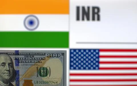 100 US dollars  on blurred background of India and USA flags Stock Photos