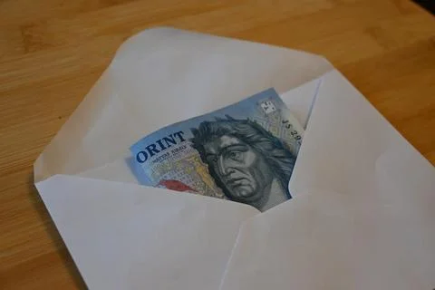 1000 forint banknotes in envelope on table Fotos Stock