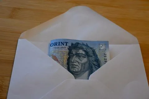 1000 forint banknotes in envelope on table Fotos Stock
