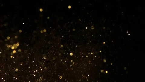 1000 fps Gold dust on black Stock Footage