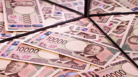 10,000 yen bills reflected in the mirror, rotating. Stock Footage 304254029