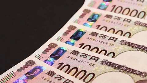 10,000 yen notes close up rotating Stock Footage 310480063