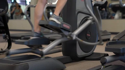 100155, Eliptical Indoor exercise Stock Footage 127644916