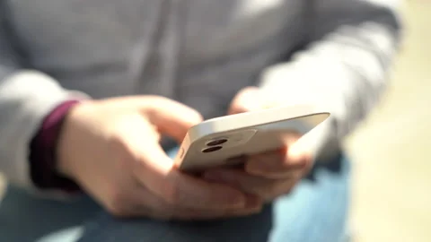 100212, Person texting Stock Footage 153143788