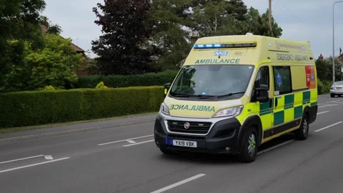 100fps. UK ambulance responding to emergency, flashing lights. Hull.UK. 7.5.2026 Video stock 335927459