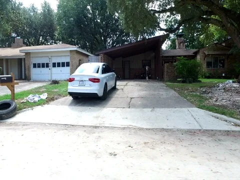 10/10/17 Dickinson, TX: Trash and debris on the streets of a flooded home Stock Footage 80922366
