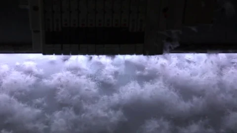 1019 Slow motion of the down filling machines selecting down with sensors, se Vídeo Stock 76559643