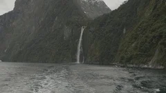 Waterfall in Milford Sound. Slowly tracking out.
