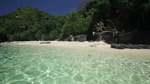 104 AWild white sand  beach with  sky-blue water Stock Footage 10796822