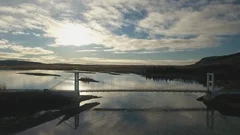 Iceland Aerial Drone 4K - Jeep Wrangler Unlimited car drives over bridge