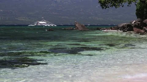 105 White sand  beach and  swaying boat Video stock 10799152