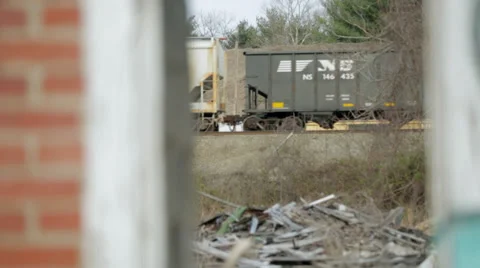 1050 Freight Train Moving Past Debris Stock Footage 36512107