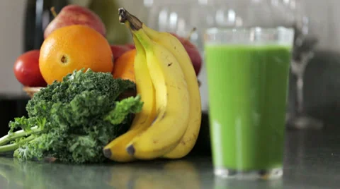 1059 Rack Focus Fruit to Green Smoothie Stock Footage 36744031