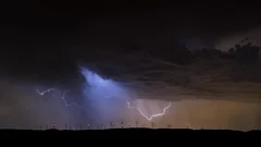 Extreme lightning storm timelapse. Supercell thunderstorm clouds.
