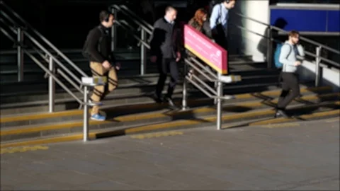 1080 25fps walking down the station stairs Stock Footage 120172683