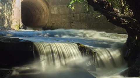 1080i. Waterfall in the dynamics on the hillside. Timelapse Stock Footage 67628395