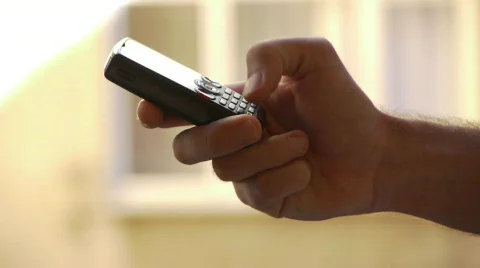 1080p Calling via mobile on white background / writing text message  Stock Footage 541984