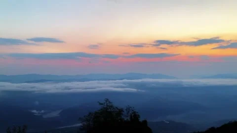 1080p Rhythmic Cloud Layers Flowing in Red and Blue Sunset Glow Stock-Footage 332182806
