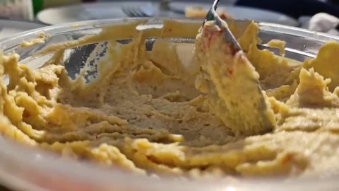 1080p - Spoon getting some hummus to enjoy Stock Footage 141558633