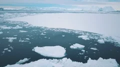 Flying fast and low over Greenland sea-ice, melting Arctic