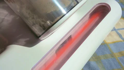 10x slow motion of a working mite remover close up Stock Footage 312709618