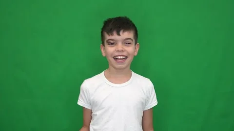 11 brunette boy in a white jacket plays the recorder Stock Footage 268429457
