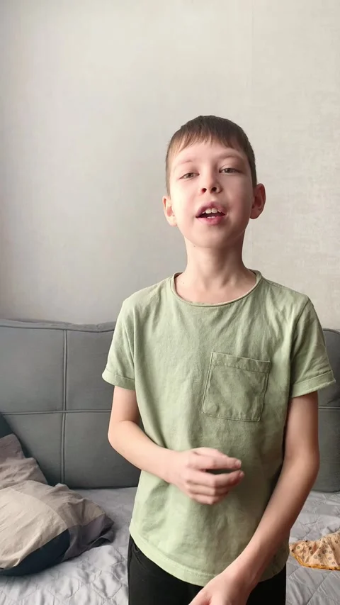 11-year-old boy recites a Tatar verse by Gabdulla Tukay Stock Footage 261049823