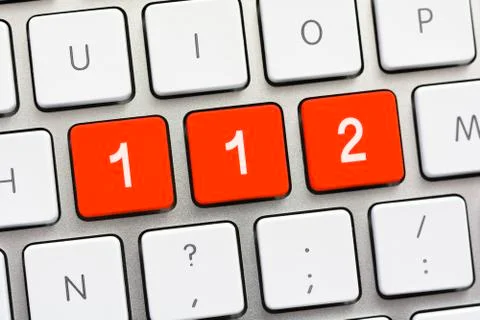 112 writing on white keyboard Stock Photos