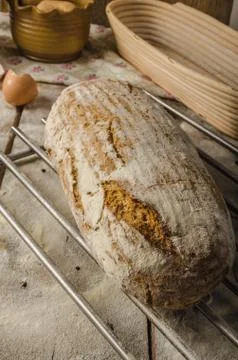 Homemade  rustic  bread,  baked  in  oven,  wheat  leaven,  breaded  in  a  basket xkwx bread,  bakery,  food,  fresh,  background,  wheat,  loaf,  organic,  flour,  grain,  wooden,  table,  whole,  white,  baking,  healthy,  bake,  meal,  rustic,  breads,  brown,  dough,  breakfast,  agriculture,  eating,  rye,  closeup,  dark,  traditional,  baked,  wood,  homemade,  isolated,  baguette,  gourmet,  natural,  pastry,  diet,  seed,  oat,  black,  basket,  leaven,  bio