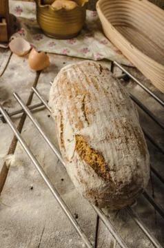 Homemade  rustic  bread,  baked  in  oven,  wheat  leaven,  breaded  in  a  basket xkwx bread,  bakery,  food,  fresh,  background,  wheat,  loaf,  organic,  flour,  grain,  wooden,  table,  whole,  white,  baking,  healthy,  bake,  meal,  rustic,  breads,  brown,  dough,  breakfast,  agriculture,  eating,  rye,  closeup,  dark,  traditional,  baked,  wood,  homemade,  isolated,  baguette,  gourmet,  natural,  pastry,  diet,  seed,  oat,  black,  basket,  leaven,  bio