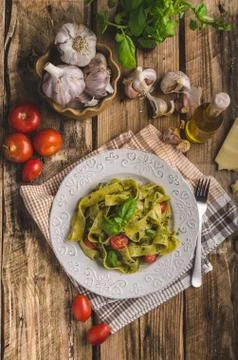 Pasta  with  basil  pesto,  very  simple  and  delicious.  Pesto  from  olive  oil,  basil,  nuts  and  parmasan xkwx pasta,  pesto,  food,  basil,  sauce,  italian,  green,  spaghetti,  plate,  healthy,  spinach,  tagliatelle,  white,  dish,  cheese,  cuisine,  meal,  cooking,  herb,  tasty,  traditional,  italy,  gourmet,  dinner,  lunch,  restaurant,  oil,  parmesan,  fresh,  background,  eating,  leaf,  fettuccine,  homemade,  diet,  garlic,  vegetarian,  closeup,  vegetable,  photography,  mediterranean,  parmasan,  milan,  olive,  bio,  organic