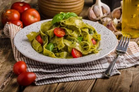 Pasta  with  basil  pesto,  very  simple  and  delicious.  Pesto  from  olive  oil,  basil,  nuts  and  parmasan xkwx pasta,  pesto,  food,  basil,  sauce,  italian,  green,  spaghetti,  plate,  healthy,  spinach,  tagliatelle,  white,  dish,  cheese,  cuisine,  meal,  cooking,  herb,  tasty,  traditional,  italy,  gourmet,  dinner,  lunch,  restaurant,  oil,  parmesan,  fresh,  background,  eating,  leaf,  fettuccine,  homemade,  diet,  garlic,  vegetarian,  closeup,  vegetable,  photography,  mediterranean,  parmasan,  milan,  olive,  bio,  organic