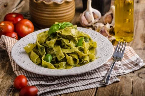 Pasta  with  basil  pesto,  very  simple  and  delicious.  Pesto  from  olive  oil,  basil,  nuts  and  parmasan xkwx pasta,  pesto,  food,  basil,  sauce,  italian,  green,  spaghetti,  plate,  healthy,  spinach,  tagliatelle,  white,  dish,  cheese,  cuisine,  meal,  cooking,  herb,  tasty,  traditional,  italy,  gourmet,  dinner,  lunch,  restaurant,  oil,  parmesan,  fresh,  background,  eating,  leaf,  fettuccine,  homemade,  diet,  garlic,  vegetarian,  closeup,  vegetable,  photography,  mediterranean,  parmasan,  milan,  olive,  bio,  organic