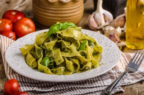 Pasta  with  basil  pesto,  very  simple  and  delicious.  Pesto  from  olive  oil,  basil,  nuts  and  parmasan xkwx pasta,  pesto,  food,  basil,  sauce,  italian,  green,  spaghetti,  plate,  healthy,  spinach,  tagliatelle,  white,  dish,  cheese,  cuisine,  meal,  cooking,  herb,  tasty,  traditional,  italy,  gourmet,  dinner,  lunch,  restaurant,  oil,  parmesan,  fresh,  background,  eating,  leaf,  fettuccine,  homemade,  diet,  garlic,  vegetarian,  closeup,  vegetable,  photography,  mediterranean,  parmasan,  milan,  olive,  bio,  organic