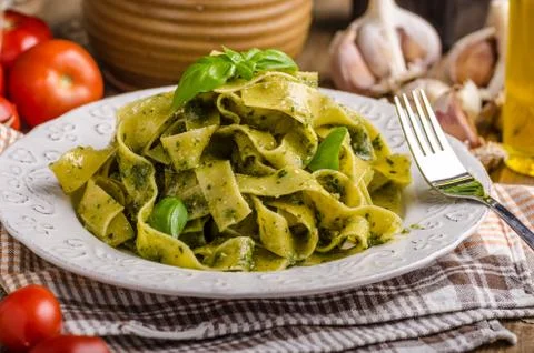 Pasta  with  basil  pesto,  very  simple  and  delicious.  Pesto  from  olive  oil,  basil,  nuts  and  parmasan xkwx pasta,  pesto,  food,  basil,  sauce,  italian,  green,  spaghetti,  plate,  healthy,  spinach,  tagliatelle,  white,  dish,  cheese,  cuisine,  meal,  cooking,  herb,  tasty,  traditional,  italy,  gourmet,  dinner,  lunch,  restaurant,  oil,  parmesan,  fresh,  background,  eating,  leaf,  fettuccine,  homemade,  diet,  garlic,  vegetarian,  closeup,  vegetable,  photography,  mediterranean,  parmasan,  milan,  olive,  bio,  organic
