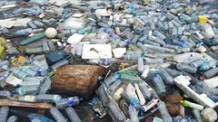 Plastic pollution trash in ocean with different kinds of garbage - plastic