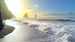 Huge waves crashing and splashing on a Black Beach in Iceland. Ocean Sea