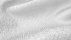 Close up detailed cloth texture of shiny spandex cloth with dolly shot.