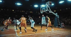 Basketball players on big professional arena during the game