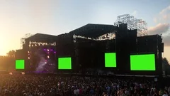 Crowd of Fans at Concert Show with Green Screens. 4K.