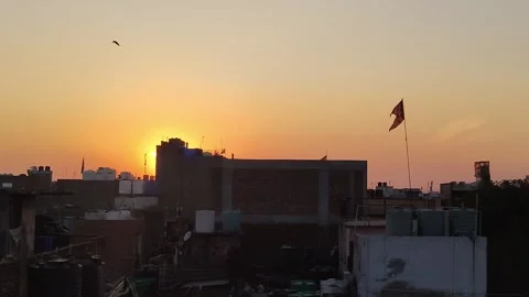 12-03-24; View of rooftops of houses in Delhi, during the evening with sunset. Stock-Footage 271504473