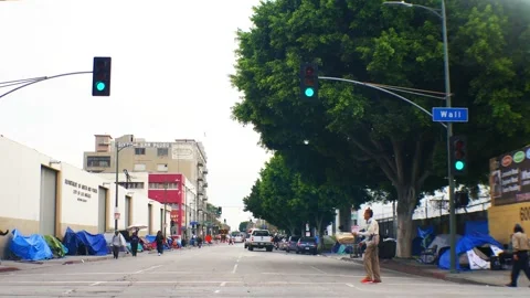 12 4K MOTION DTLA 6th ST Homeless Encampment 1 Tents People Stock Footage 165766364