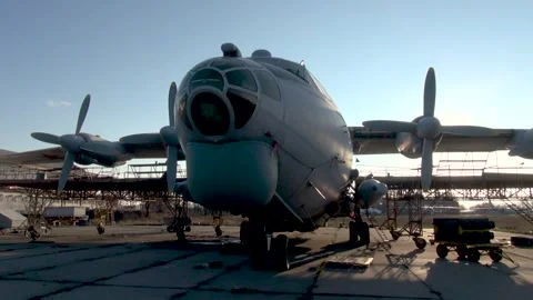 An-12 aircraft (NATO - Cube) of operation is in open parking lot. Close-up. Stock Footage 197409582