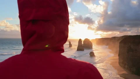12 Apostles, Tracking From Behind Lady Stock Footage 131641468