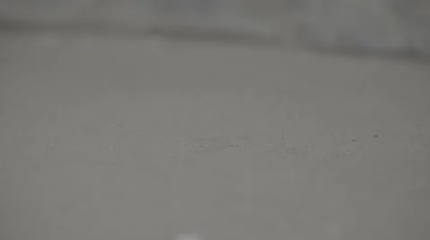 12 gauge shotgun shells falling on concrete, slow motion Stock Footage 61940870