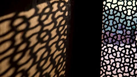 12 Jan 2024- On Adjacent wall of Mughal Era shadow from Jali window in sunlight. Stock Footage 261555762