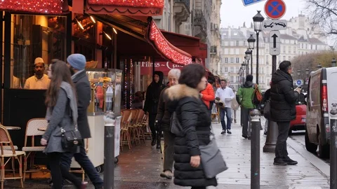 12 Rainy gray winter day Paris people walk by bakary food point on street Stock Footage 100851937