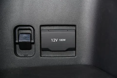 12 Volts power outlet socket in the car Stock Photos