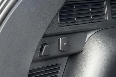 12 Volts power outlet socket in the car Stock Photos