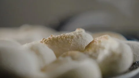120 fps in slow motion set fire to pieces of marshmallows Stock Footage 101733319